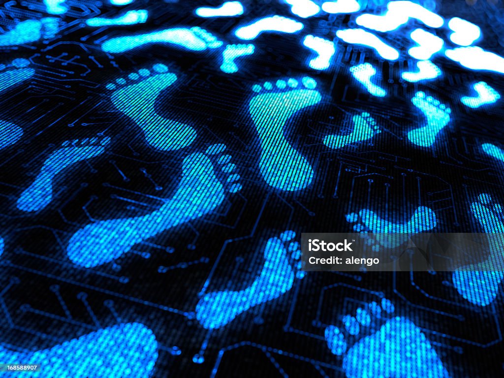 Blue footprints over a circuit board Walking Footprint Stock Photo