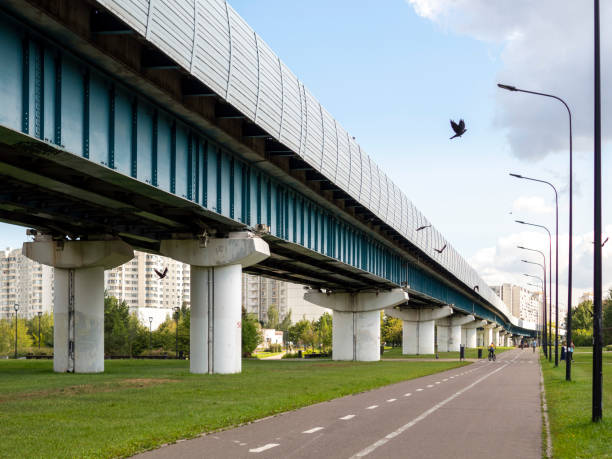 istock metro above ground along the park 1685901318