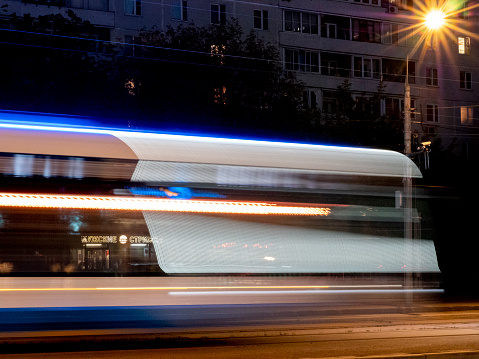 blurry tram at night