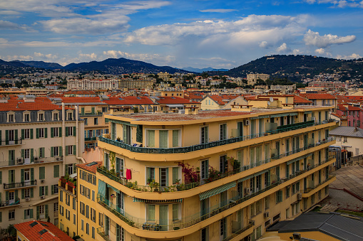 Aerial view of the bourgeois buildings and terracotta rooftops of the Carre d'Or Golden Square chic seafront district in Nice, South of France