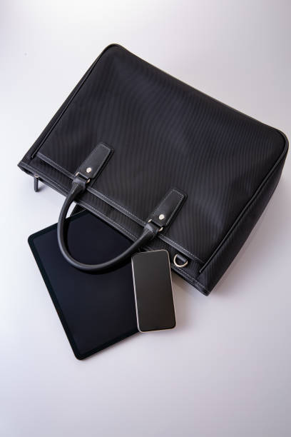 istock Business bag and tablet device. business image 1685941203