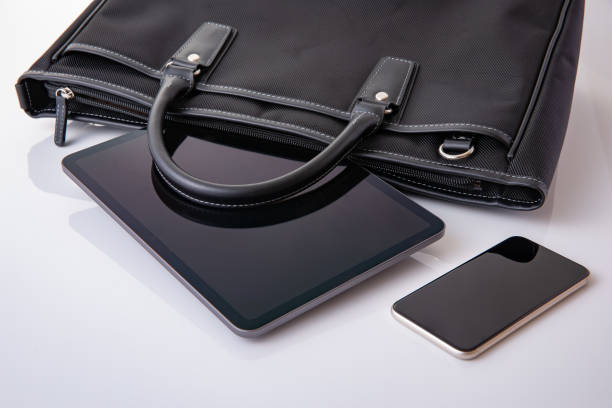 istock Business bag and tablet device. business image 1685946925