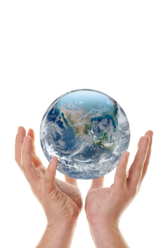 Hand holding up globe, all graphics elements are my own design/photo.