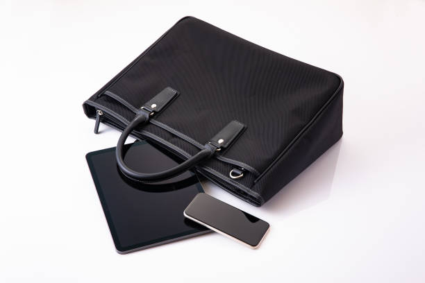 istock Business bag and tablet device. business image 1685960486