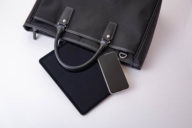 istock Business bag and tablet device. business image 1685964121
