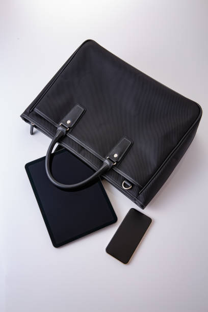 istock Business bag and tablet device. business image 1685967713