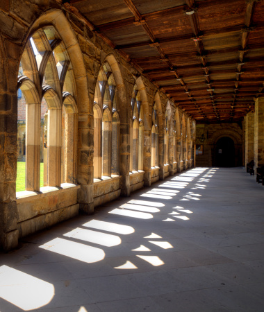 The cloisters in Durham Cathedral on a sunny day.