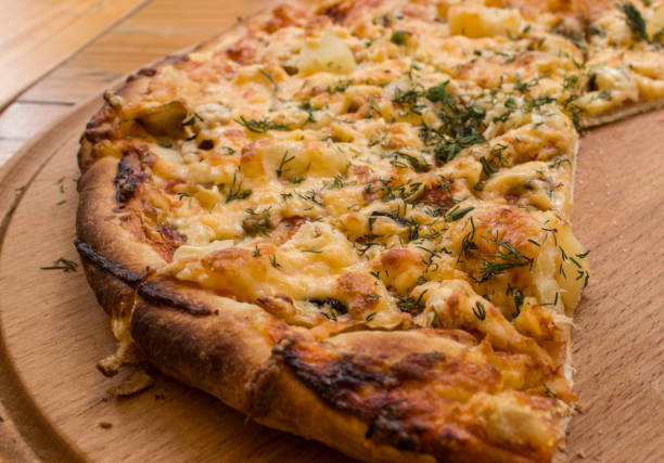 istock Photo of cut pizza on a plate. 1685996559