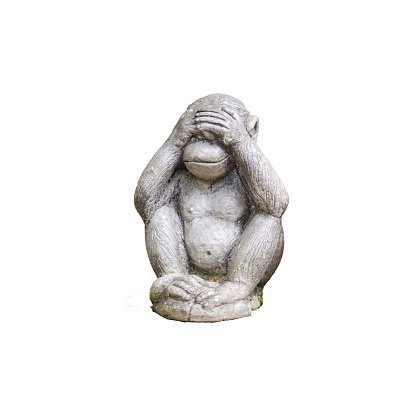 monkey small statues with the concept of Close your eyes or see no evil. isolated on white background with clipping path