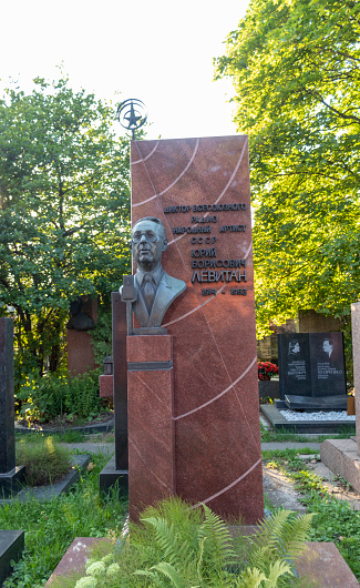 Moscow, Russia - 08.06.2023 - Memorial to the famous soviet russian radio presenter Yuriy Levitan at novodevichy cemetery