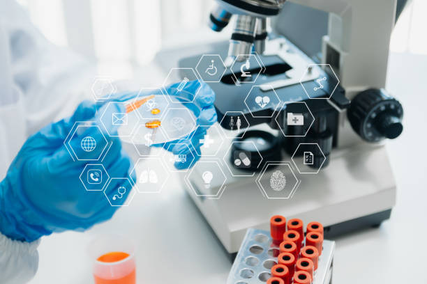 istock DNA molecule testing concepts. The doctor in a mask examines DNA molecules on the chemical laboratory with virtual icon 1686039738