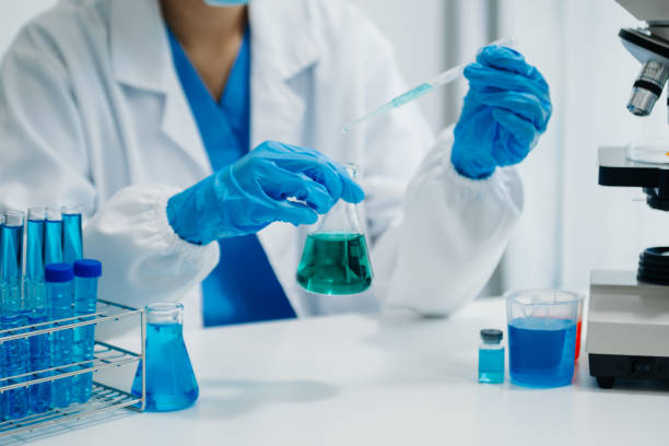 istock Modern medical research laboratory. female scientist working with micro pipettes analyzing biochemical samples, advanced science chemical laboratory 1686040515