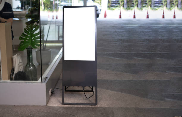 istock White and blank electronic advertising for ad space text fill in public space in front of restaurant clouded people seeing in mall. 1686053979