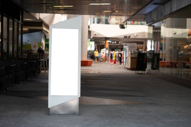 istock White and blank electronic advertising for ad space text fill in public space, clouded people seeing in mall. 1686054056