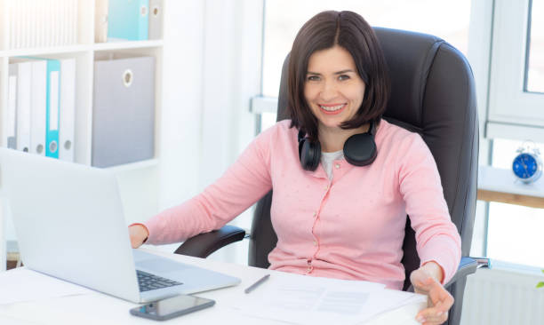 istock Cheerful business woman at workplace 1686056684