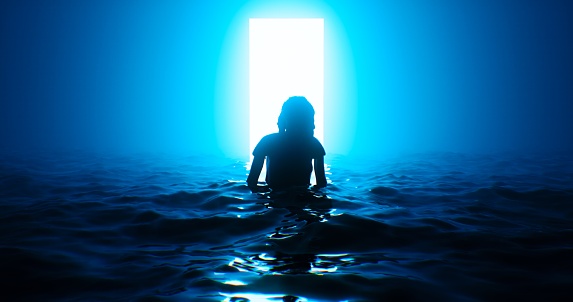 In absolute darkness at night, a girl up to her waist in water goes to a shining rectangle of light in the depths