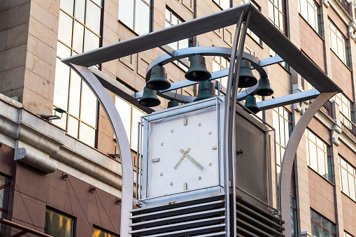 Close up shot of the large outdoor clock on the street