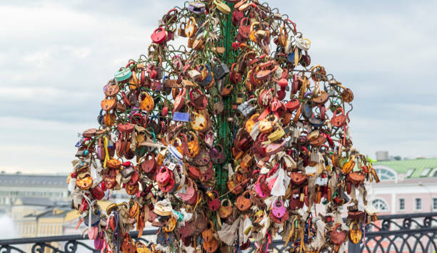 istock Metal tree structure where couples locking the locks as a sign of true love. Concept 1686100359