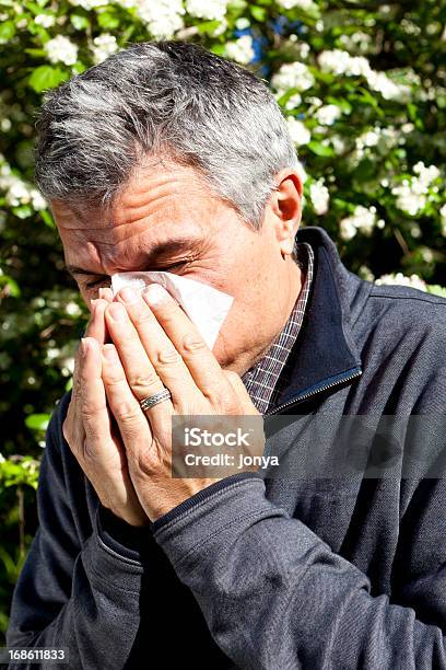 Foto de Closeup Do Homem Soprando Seu Nariz e mais fotos de stock de 50-54 anos - 50-54 anos, Adulto, Adulto maduro