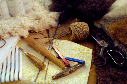 Craftsmans tools and materials for bed upholstery