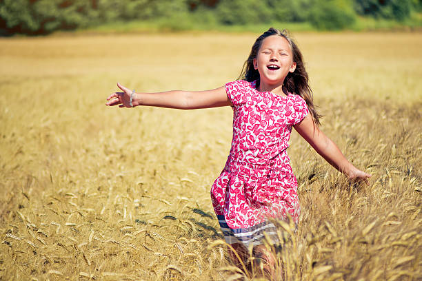 istock Child in the wheat field 168613114