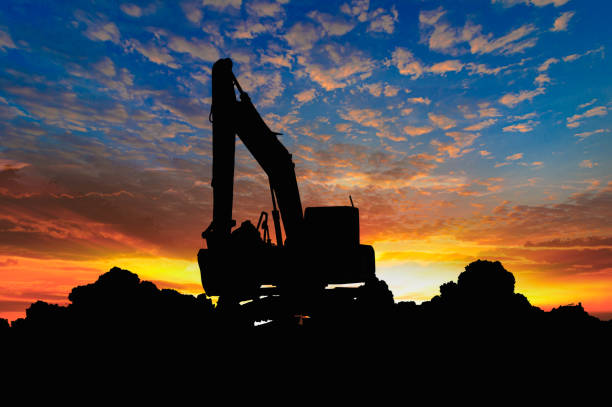 istock Crawler excavators silhouette are digging the soil 1686131917