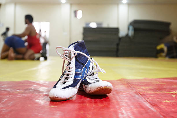 Wrestling boots at the gym Wrestling boots at the gym wrestling stock pictures, royalty-free photos & images
