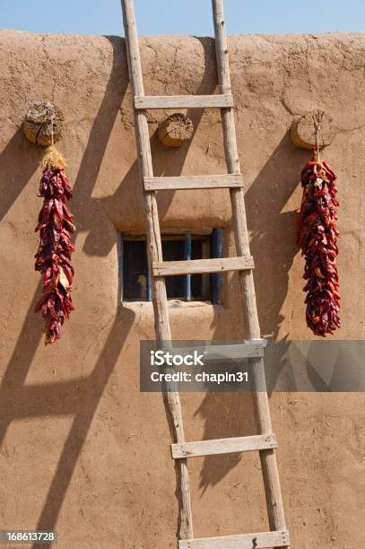 Ladder Adobe And Chili Peppers Stock Photo - Download Image Now - Pueblo - Built Structure, Taos, Adobe - Material