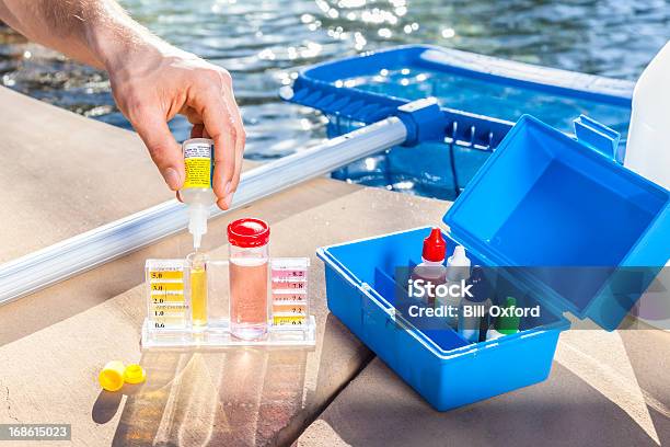 Pool Chemistry Testing Stock Photo - Download Image Now - Swimming Pool, Cleaning, Repairing