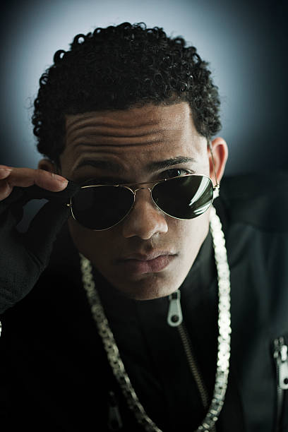istock Young man with sunglasses _ Vertical. 168615136