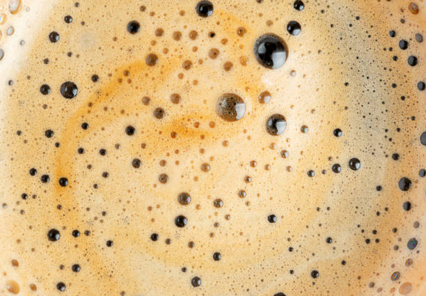 istock Cappuccino creamy milk foam texture. Top view 1686162347