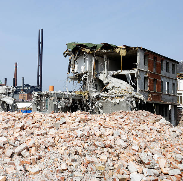 istock Pile of brick and demolished house 168617388