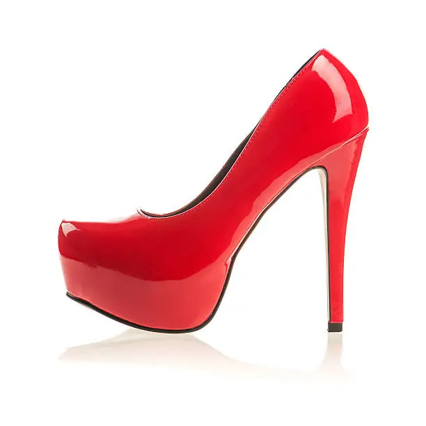 Fancy platform High Heels in red patent leather, Isolated on white, lots of copy space. See related images:
