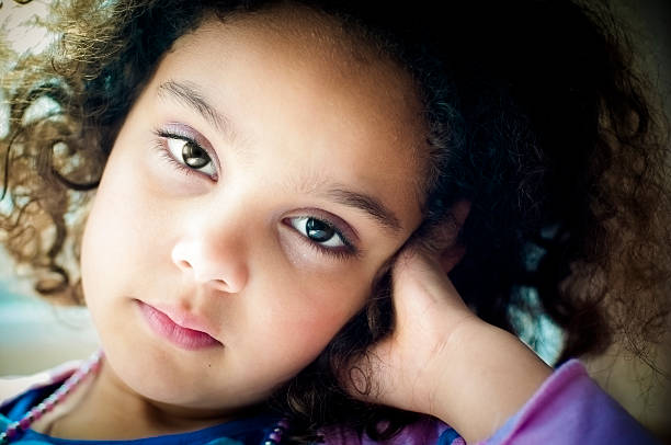 Pensive 6 Years old Little Girl Royalty free stock photo of 6 years old girl looking contemplative. critical thinking kids stock pictures, royalty-free photos & images