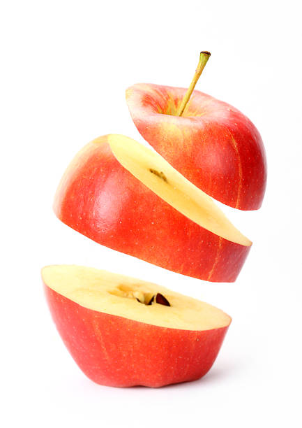 suspendu pomme - red delicious apple apple fruit vertical photos et images de collection