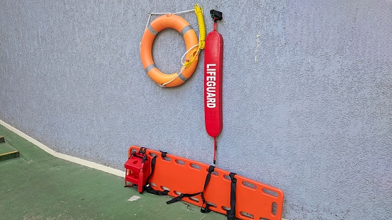 Safety equipment for drowning victims ready to be used, rescue equipment for drowning victims hanging on a wall