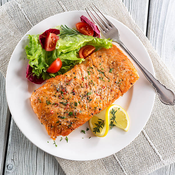 istock Grilled salmon with salad 168619809