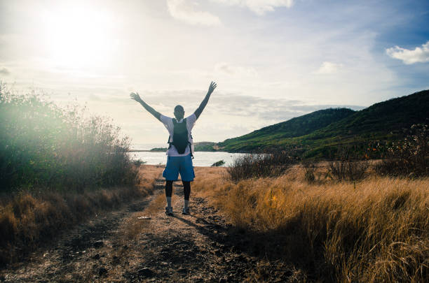 istock healthy lifestyle; man outdoors enjoying adventurous hike 168620177