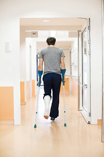 istock Man with a broken leg at the hospital 168620237