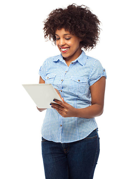 istock Young woman playing with digital tablet 168620472