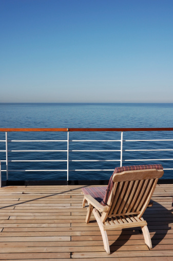 Sun lounger facing the sea on a cruise ship.