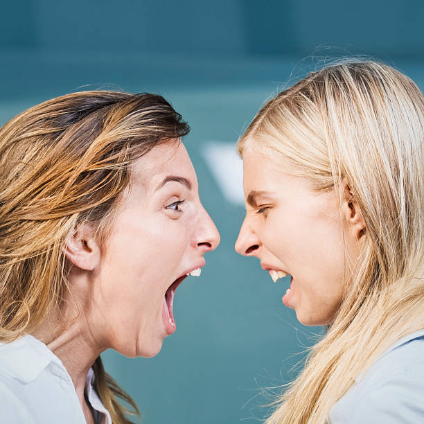 istock Angry and scared two girls fighting. 168620895