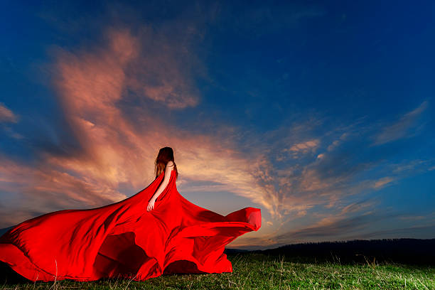 istock woman with flying dress 168622737
