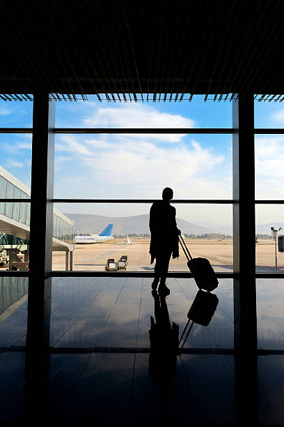 istock woman in airport 168622781