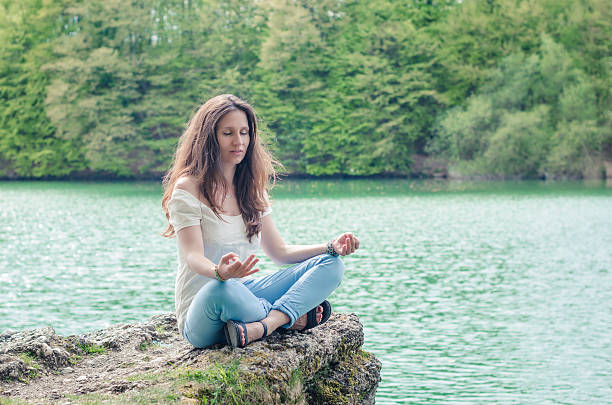 istock yoga in the nature 168622940
