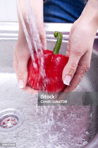 Washing Fresh Vegetables Stock Photo - Download Image Now - Adult, Bell Pepper, Blurred Motion