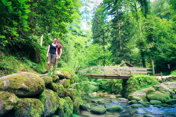 istock young couple hiking 168623884