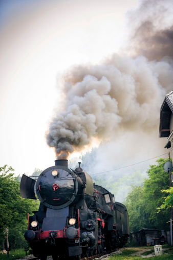 an old steam train now serving as a tourist attraction. this photo was taken at the pletna'lypse photo event in bled, slovenia.