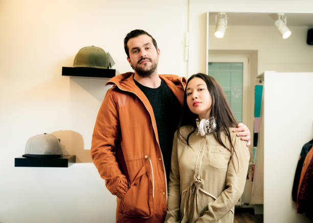istock couple shopping for clothes 168624112
