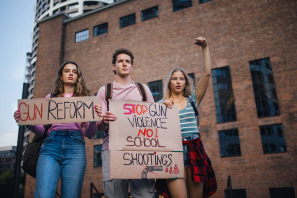 istock Generation Z activists with banners protesting on the street. 1686244543